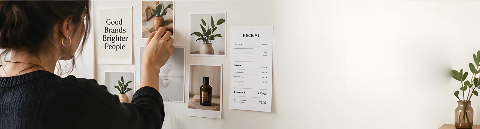 The same creator pins photo prints and a printed receipt to a wall board