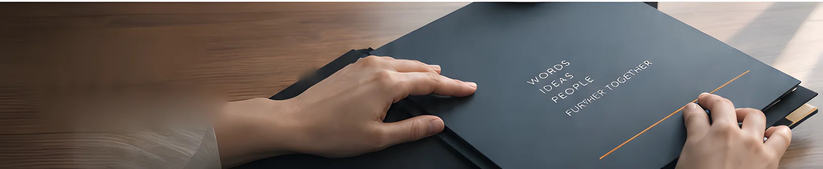Hands closing a dark document folder on a desk