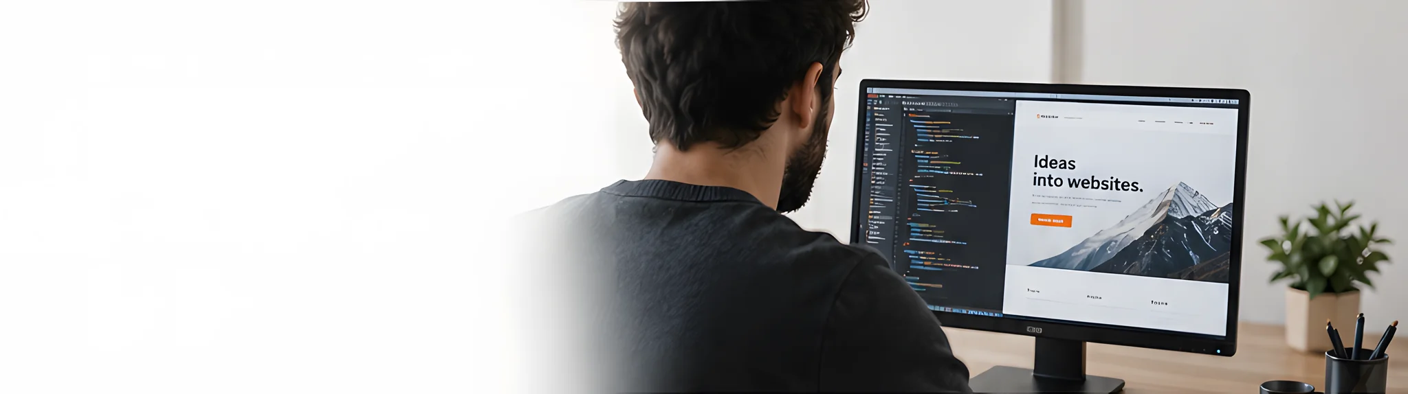 A web developer, seen from behind, works at a monitor with code on one side and a website design on the other